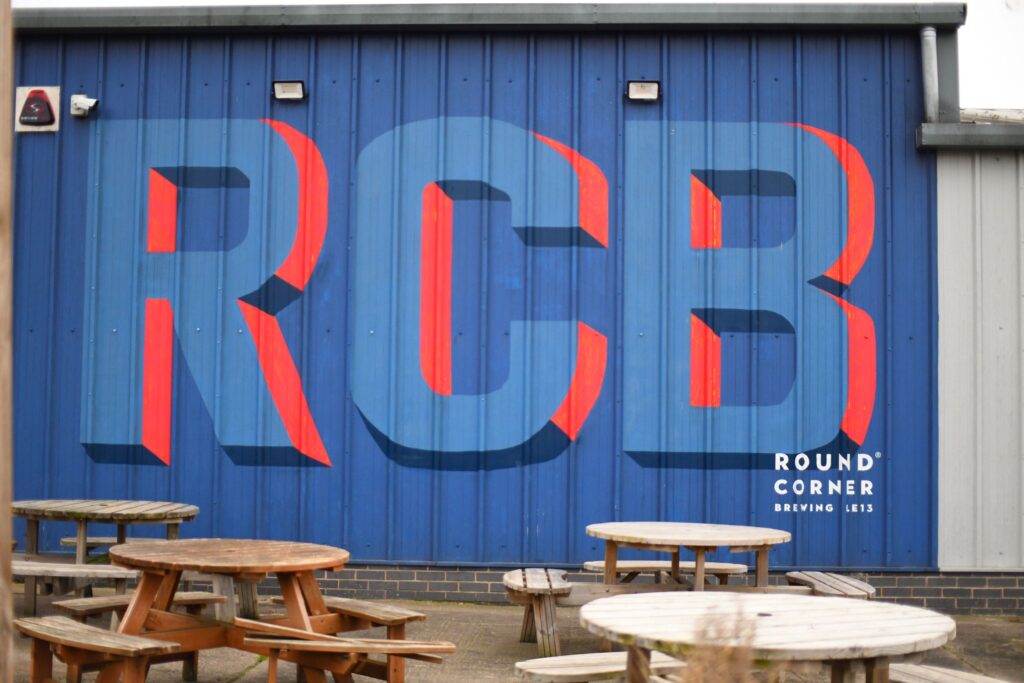 Side of a building with large letters RCB