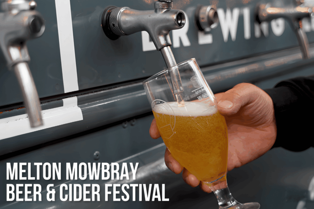 A close-up of a beer being poured from a metal tap into a tilted glass. A hand holds the glass as golden beer with a foamy head fills it. The tap is mounted on a dark bar or drinks trailer, with additional taps blurred in the background. White text in the lower-left corner reads: “Melton Mowbray Beer & Cider Festival.”