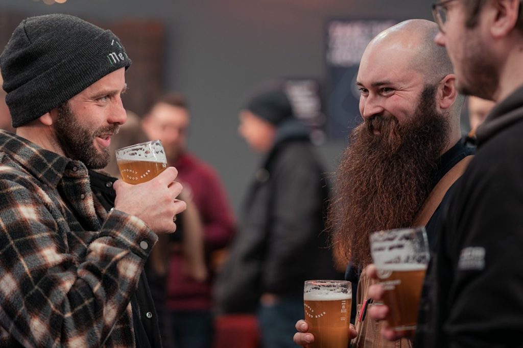 3 men drinking Round-Corner beer