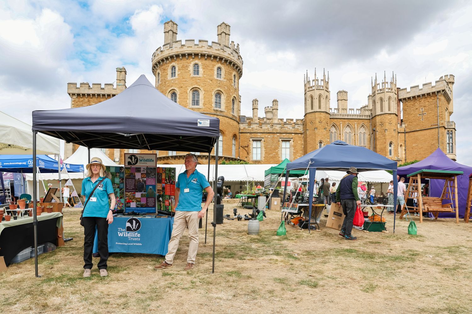 Belvoir Castle Flower & Garden Show Credit George Parish Stallholders at outdoor exhibition stands in front of Belvoir Castle during the Flower and Garden Show.