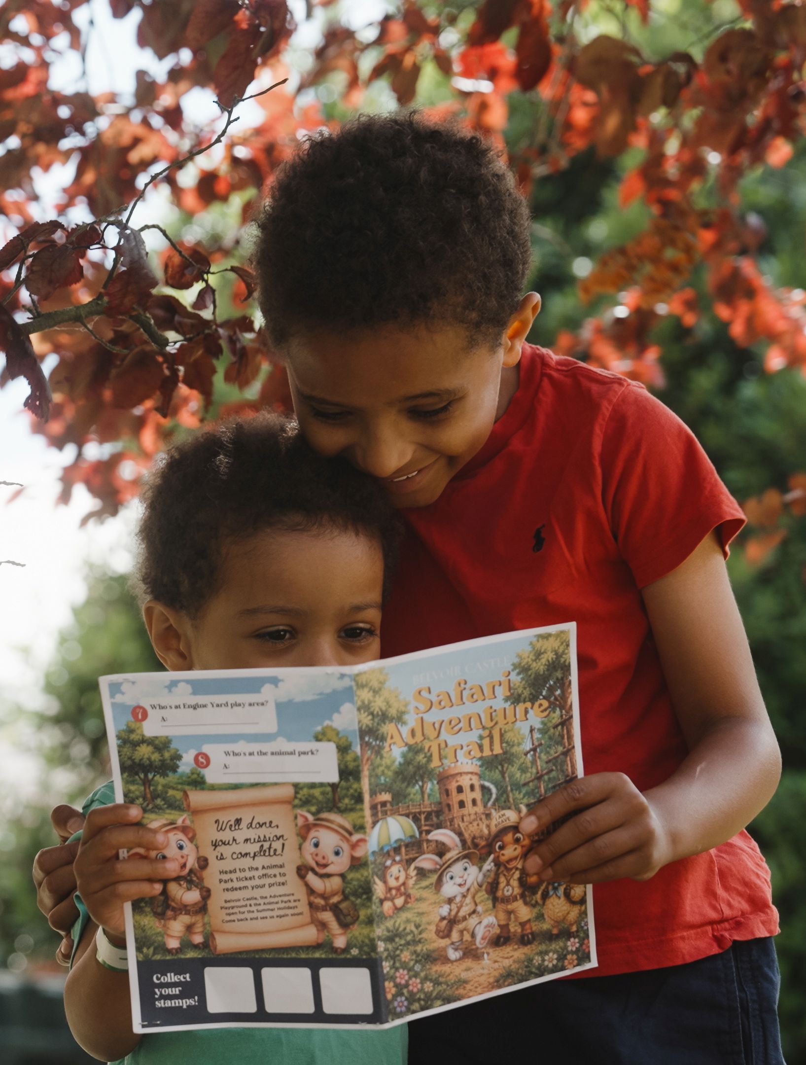 two children reading a treasure map